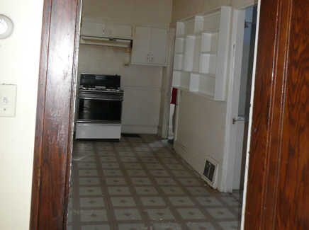 [Photo: kitchen before]